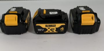 Three pre-owned 2024 DeWalt XR 18v 4AH power tool batteries.