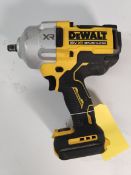 A pre-owned DeWALT DCF961 18V XR brushless 12 high torque impact wrench.