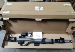 A Volvo roof mounted bicycle holder, boxed with manual (EMB6769808).