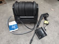 A pre-owned Grandfalls retractable pressure washer (sold as seen).