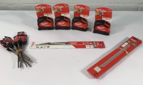 Nine Milwaukee M x 4 SDS, 6mm plus drill bits, eight Milwaukee Sawzall 300mm blades, one Milwaukee S