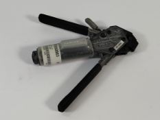 A pre-owned Band IT TIE-DEX II banding hand tool.