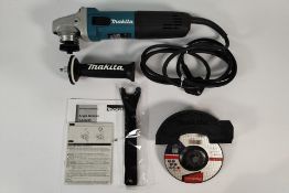 An as new Makita Angle Grinder, 125mm (5