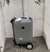 A pre-owned Robot Airwheel SE3S ride-on suitcase complete with battery.