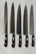 Five Wusthof French Cooks heavy bolstered knives 320mm, may have slight marks from long term storage