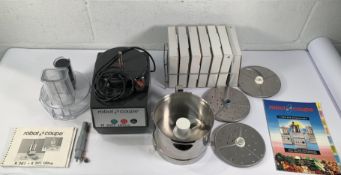 A Robot Coupe R201 Ultra, bowl and ten various cutting discs.