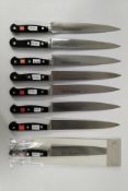 Eight Wusthof narrow slicer bolstered knives, 200mm (4520) (over 18s only).