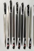 Eleven Wusthof narrow slicer bolstered knives, 320mm (4520) (over 18s only).