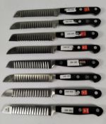 Seven Wusthof fluted decorating bolstered knives 110mm (4200) (over 18s only).
