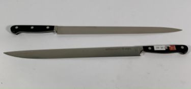 Two ED. Wusthof Dreizack Werk narrow slicer bolstered 320mm knives (4520) (over 18's only).