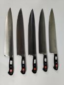 Five Wusthof French Cooks heavy bolstered knives 320mm, may have slight marks from long term storage