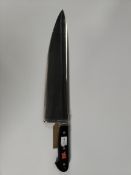 A Wusthof French Cooks, extra heavy, bolstered knife 320mm/12