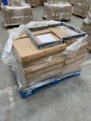 A pallet of metal furniture legs, assorted sizes.