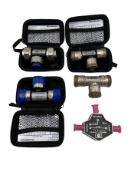 Assorted pre-owned electronic calibration kits.