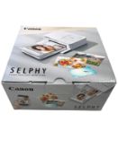 As new Canon Selphy CP1500 Compact Photo Printer (EAN: 8714574671567).