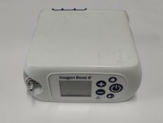 A pre-owned Inogen Rove 6 Portable Oxygen Concentrator with rechargeable battery, charger and carry
