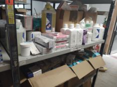 A large quantity of assorted dental, oral hygiene and other related products (Two shelves).