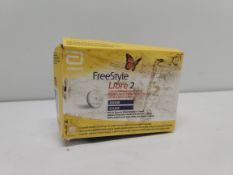 An as new Freestyle Libre 2 flash glucose monitoring system (EXP: 2026-03-31).