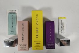 Seven assorted as new Trinny London related beauty products.