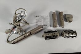 A pre-owned Shark Flexstyle Styler/Hair Dryer, HD400 X7, 120V, 60Hz, 1400W with accessories (UK adap