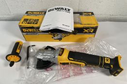 A DeWalt DCG405FN 18V XR Brushless Flat Head Angle Grinder (unit only).
