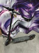 A pre-owned Mi electric scooter DDHBD02NEB (no charger, sold as seen).