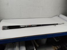 Three golf club shafts with Golf Pride grips - one Ping Alta CB, one Rogue and one Mitsubishi Chemic