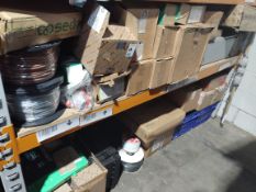 A large quantity of miscellaneous electrical, plumbing and related items on two shelves.