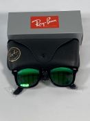 A pair of Ray-Bans Wayfarer Flash sunglasses in black with green mirror lenses (RB2140 901-19).