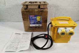 A Faithfull electric site transformer - 110v 3kVA 110 Volt, boxed (FPPTRAN33A).