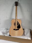 An as new Yamaha F310 NT acoustic guitar.