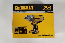 An as new DeWalt XR Brushless High Torque Impact Wrench, 18V, DCF899N, 1/2