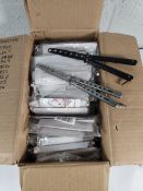 Approximately one hundred and ten unbranded black and silver butterfly knife trainers (over 18s only