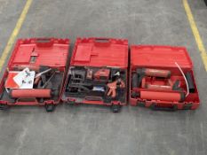 Three pre-owned Hilti cases to include laser levels, clamp and resin guns.