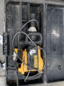 A pre-owned Dewalt hammer drill.