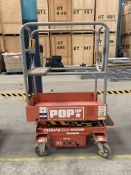 A pre-owned Pop-up Push Pro elevating work platform.