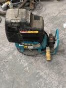 A pre-owned Makita air compressor (AC640).