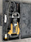 A pre-owned Dewalt hammer drill.
