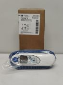 An as new Covidien Genius 3 tympanic thermometer and base (REF: 303013).