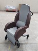 A pre-owned Drive Devilbiss Integra shell chair (44cm, 45cm, sold as seen).