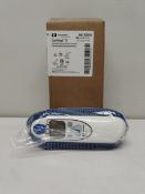 An as new Covidien Genius 3 tympanic thermometer and base (REF: 303013).