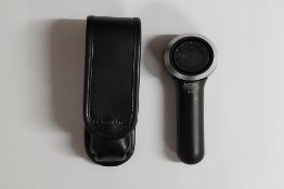 A pre-owned DermLite DL4 Pocket Dermatoscope with belt holster (DL4F0068).