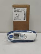 An as new Covidien Genius 3 tympanic thermometer and base (REF: 303013).