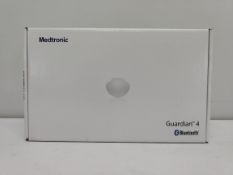 An as new Medtronic Guardian 4 Transmitter Kit (REF: MMT-7840W1, Recharge By Date: 2025-06-09).