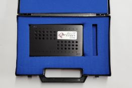 A Dynex Technologies Opsys MR Verification Plate.