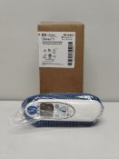 An as new Covidien Genius 3 tympanic thermometer and base (REF: 303013).