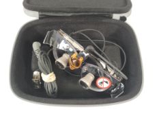 A pair of Orascoptic dental loupes, HDL 2.5 Through the Lens, Triumph, Small, Sapphire, comes with c