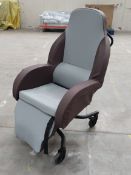 A pre-owned Drive Devilbiss Integra shell chair (50cm, 44cm, sold as seen).