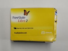 An as new Abbott FreeStyle Libre 2 flash glucose monitoring systems sensor (EXP: 2026-07-31).