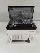 An as new Riester 3.5v xenon otoscope with C-handle, comes with two lithium batteries (REF: 3860).
